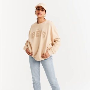 NWT Beis The Sweatshirt In Beige Size M Zip Pockets Key Leash Unisex New